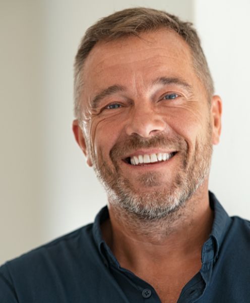 A mature guy practices healthy smile is linked to a healthy body.