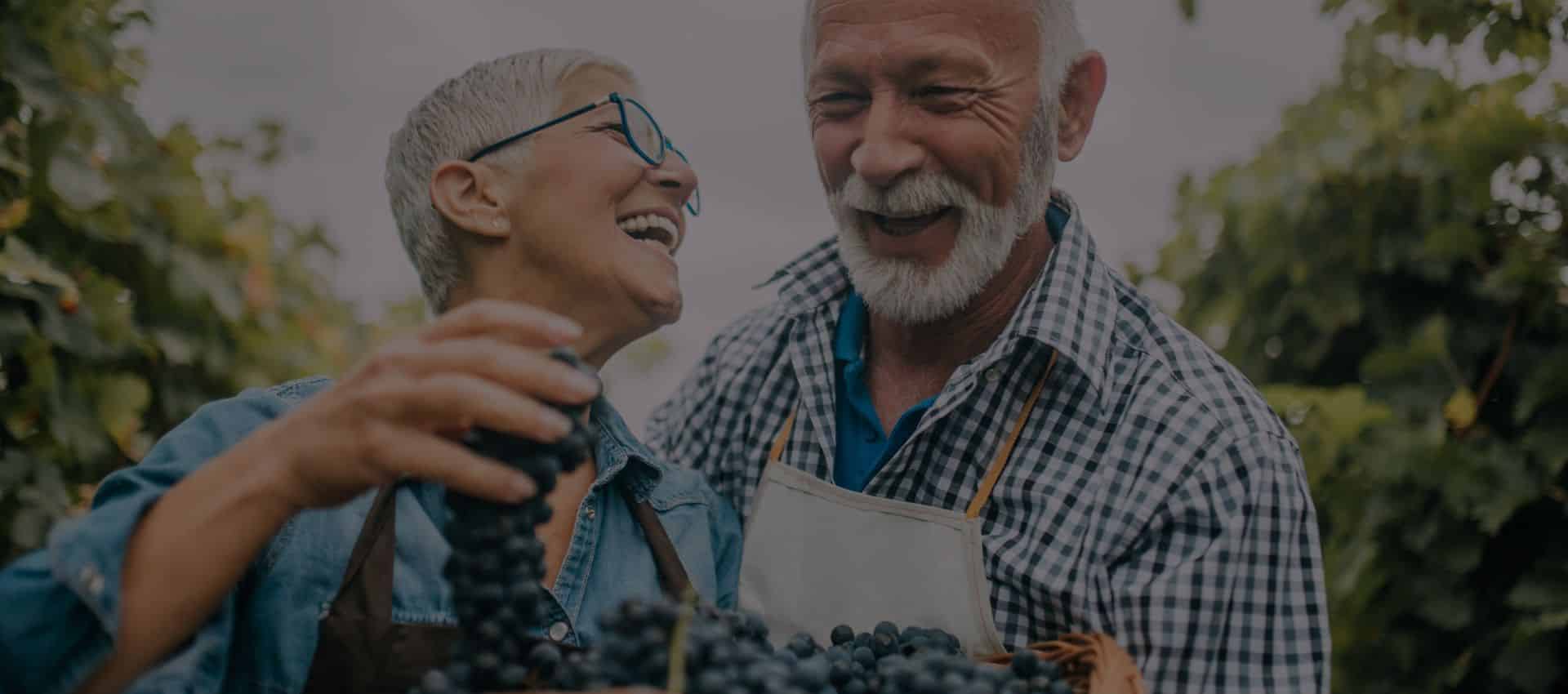 Mature couple choosing the best food for healthy teeth and gums.